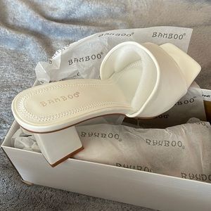NWT white slip on heels